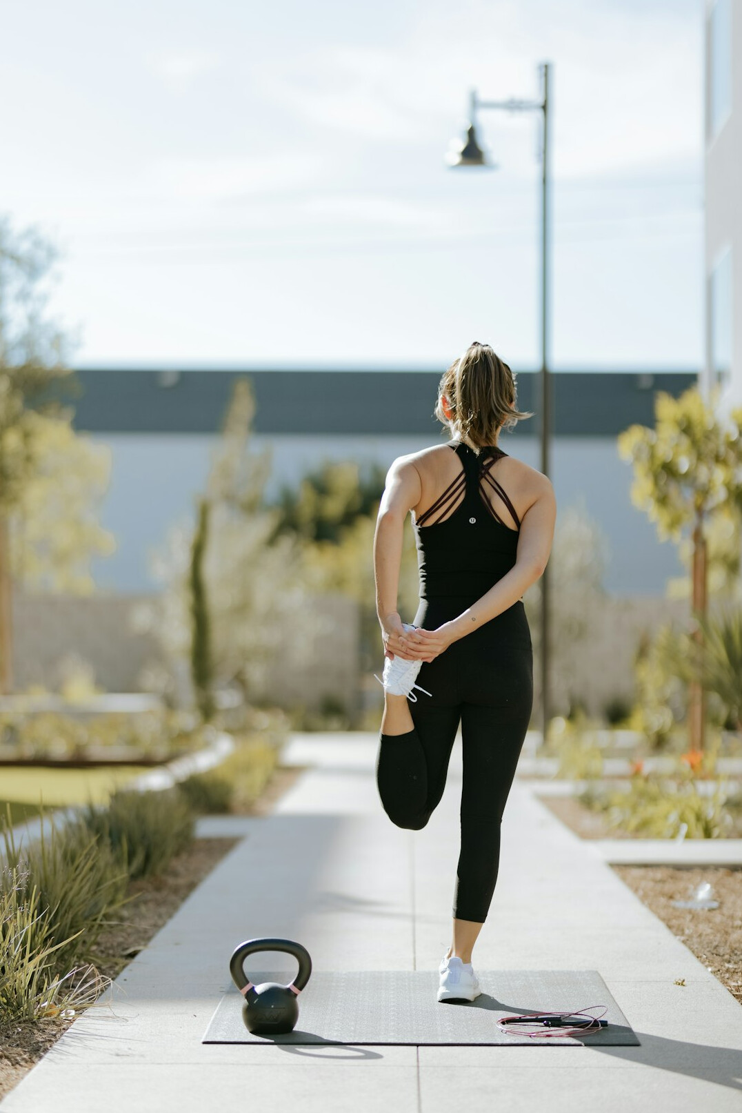 woman stretching in nature