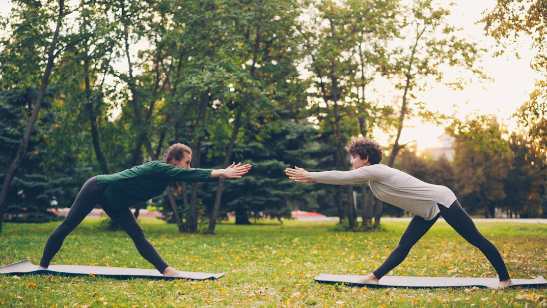 group yoga class outdoors
